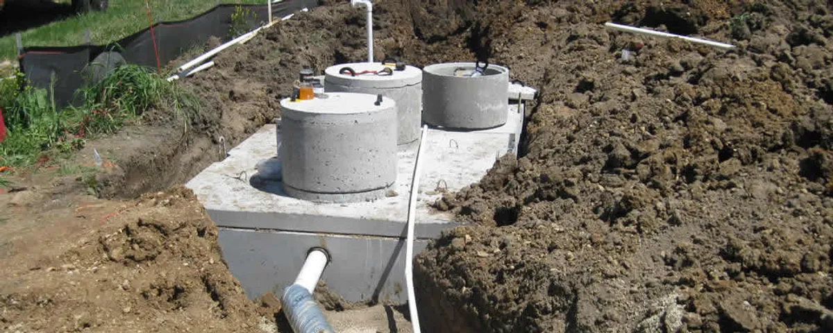 Septic system repair and installation site with tank access ports in Boise, ID